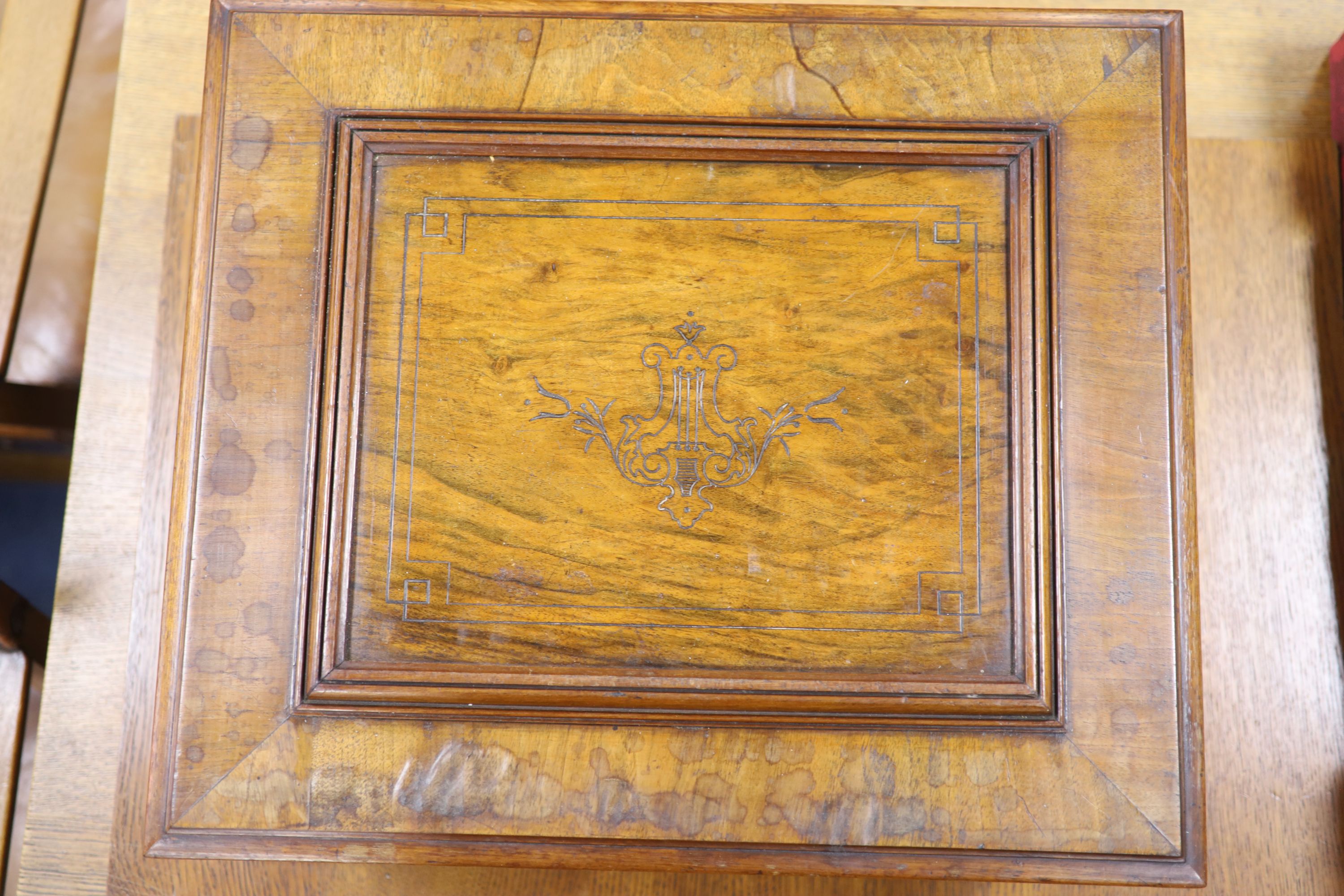 A large Polyphon walnut table top musical box, playing thirty 39.5cm discs